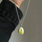 Sculpted Pistachio Nut Pendant Necklace