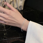 Lumin Delicate Light-Reflecting Chain Bracelet