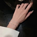 Lumin Delicate Light-Reflecting Chain Bracelet